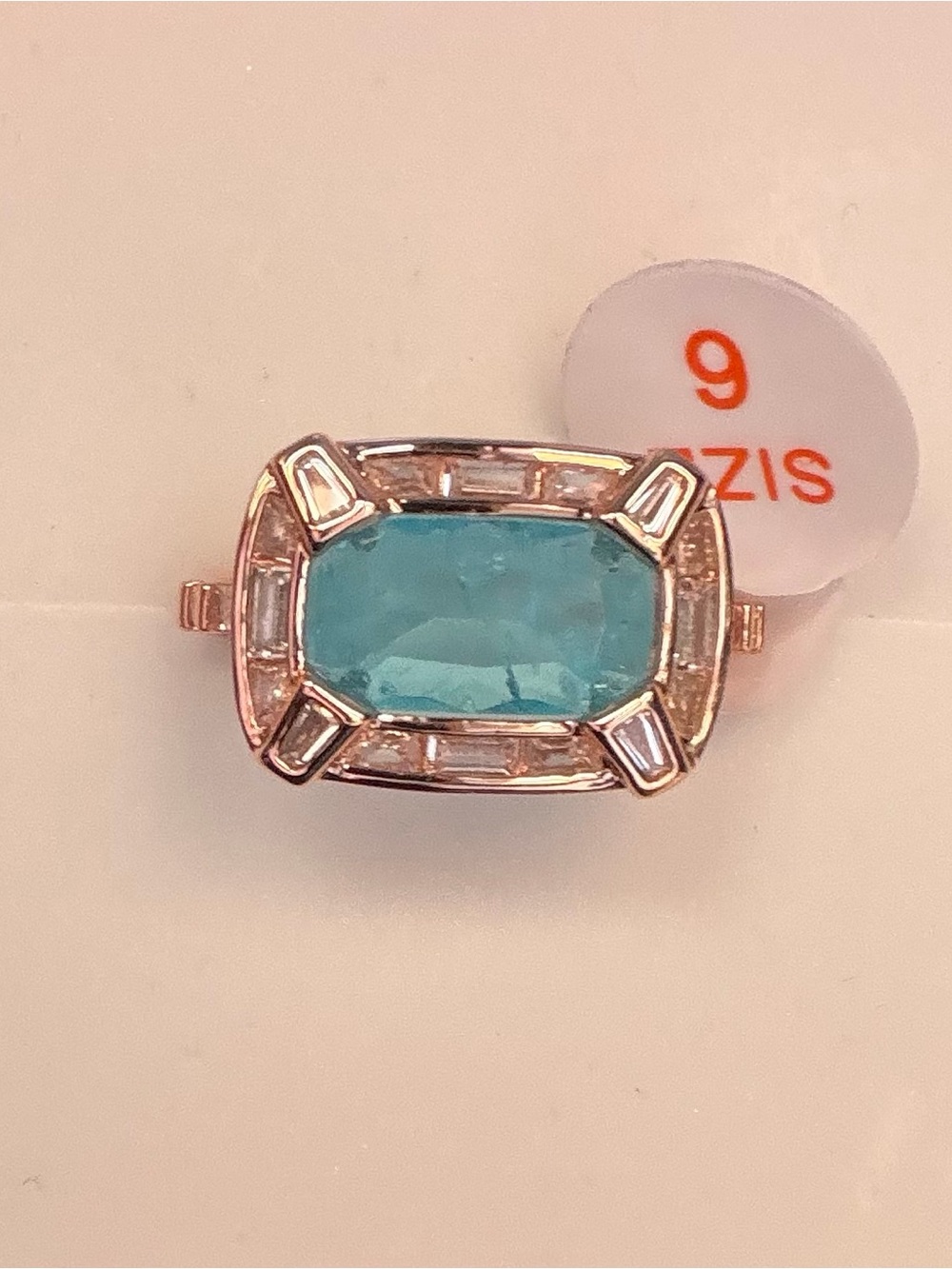 Bomb party color, changing blue topaz, rose gold plating